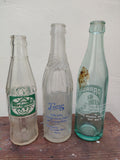 Three 1960s Maltese Soft Drink bottles
