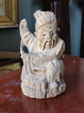 An old Asian Hand Carved Statue