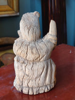 An old Asian Hand Carved Statue